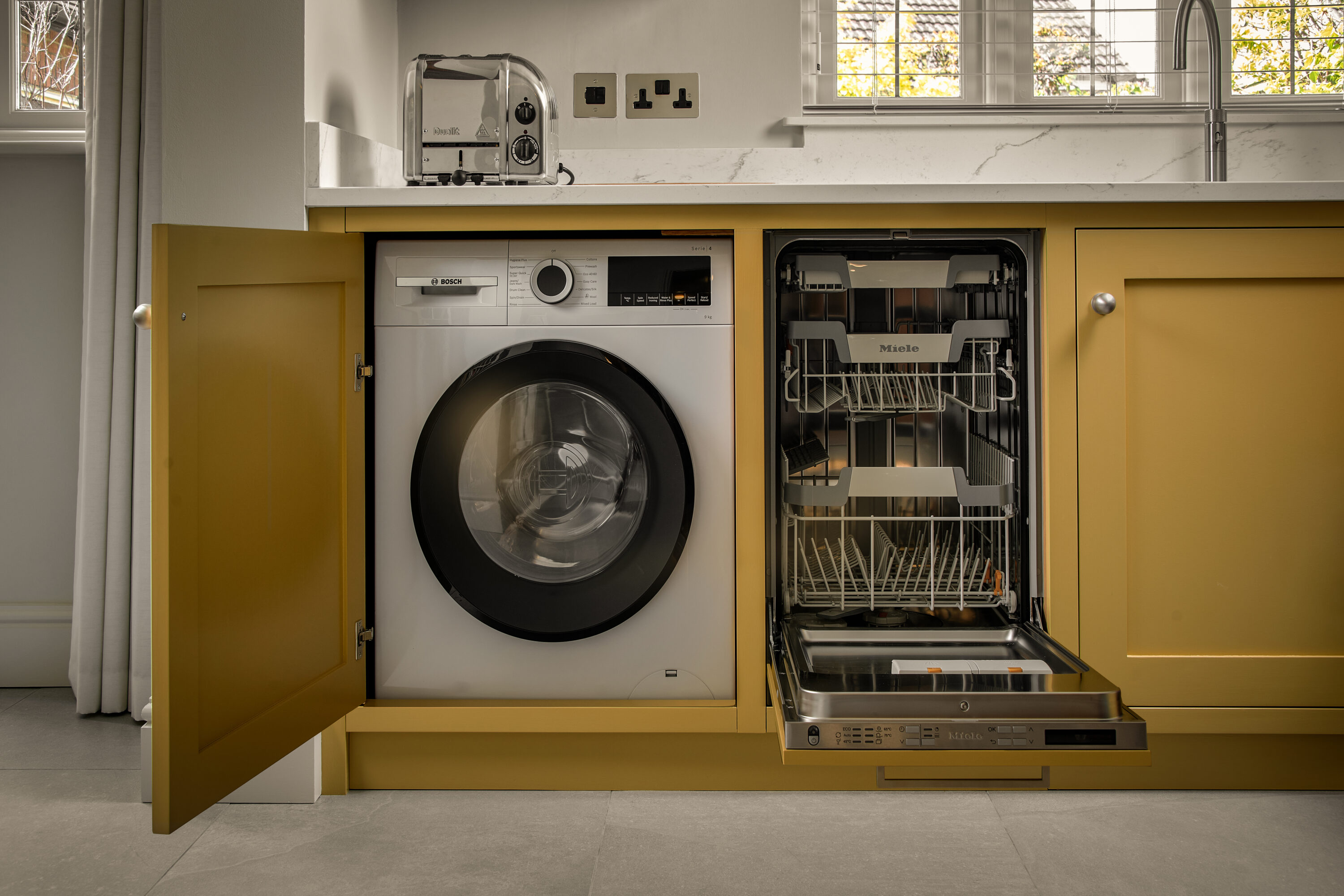 Integrated appliance in a bespoke kitchen